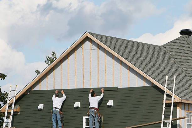 Professional Emergency Siding Repair technician working in Atwater, OH